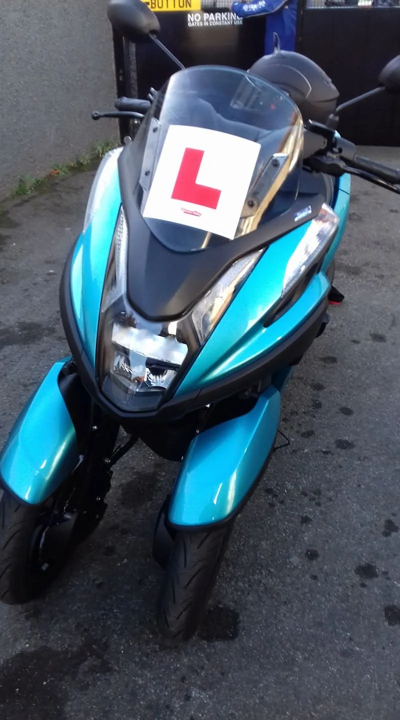 Adam’s blue delivery bike on the day it was bought